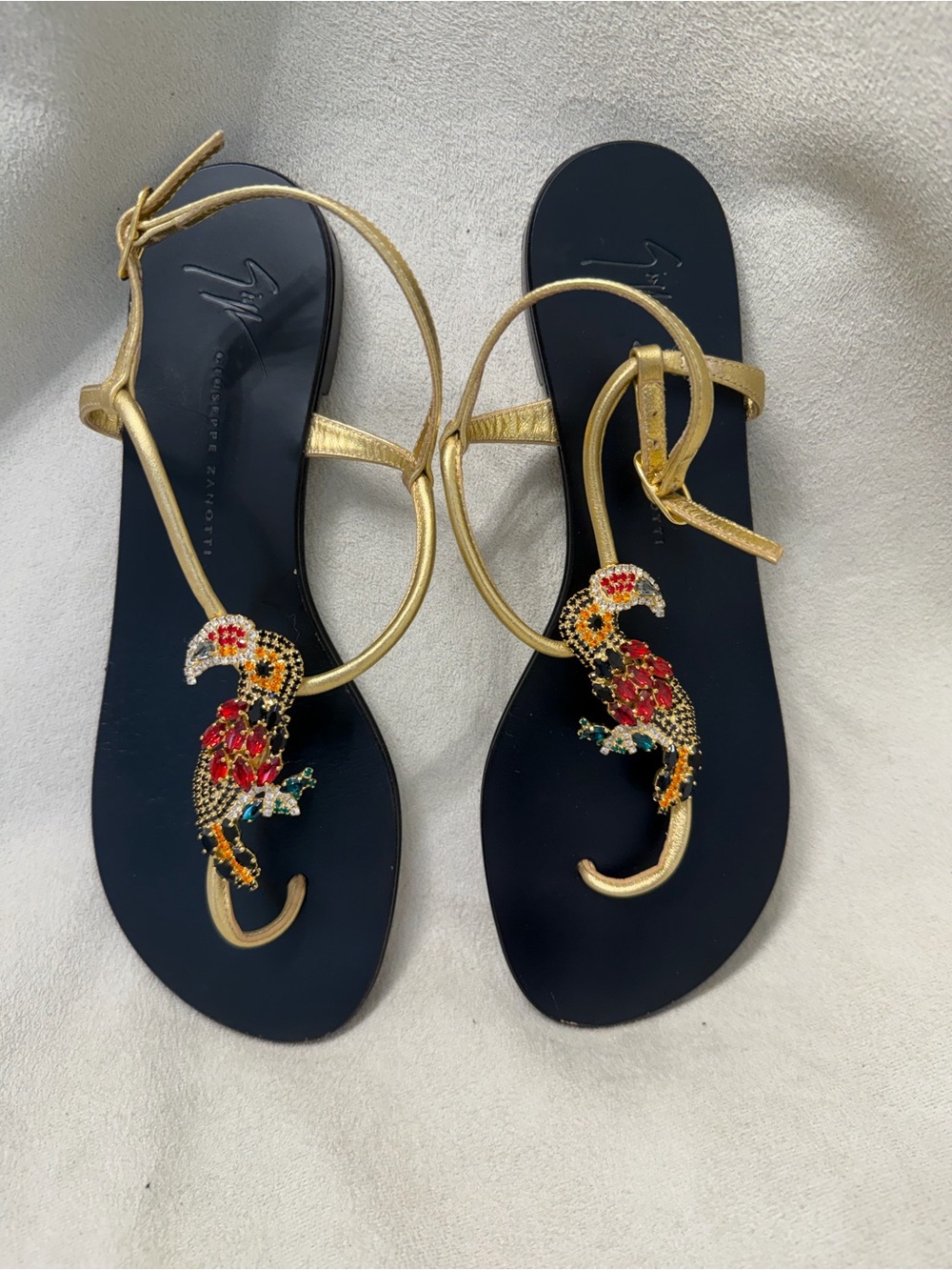Giuseppe Zanotti Black and Gold Sandals with Beaded Parrot Details